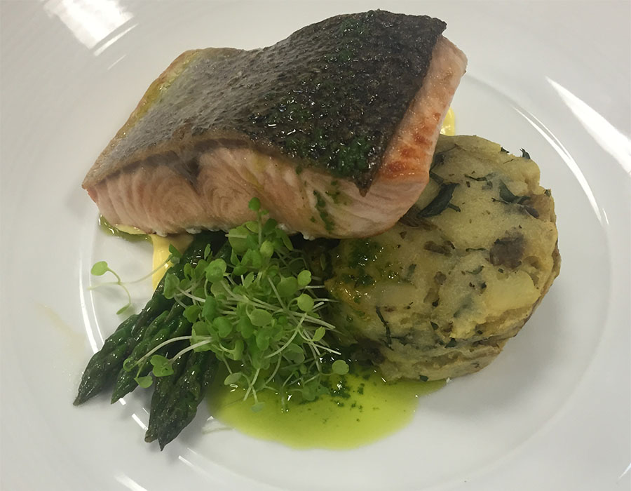 Atlantic Salmon, mint and caper crushed potatoes, charred buttered asparagus with lemon hollandaise